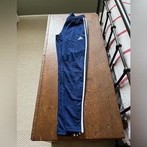 Blue Adidas track pants